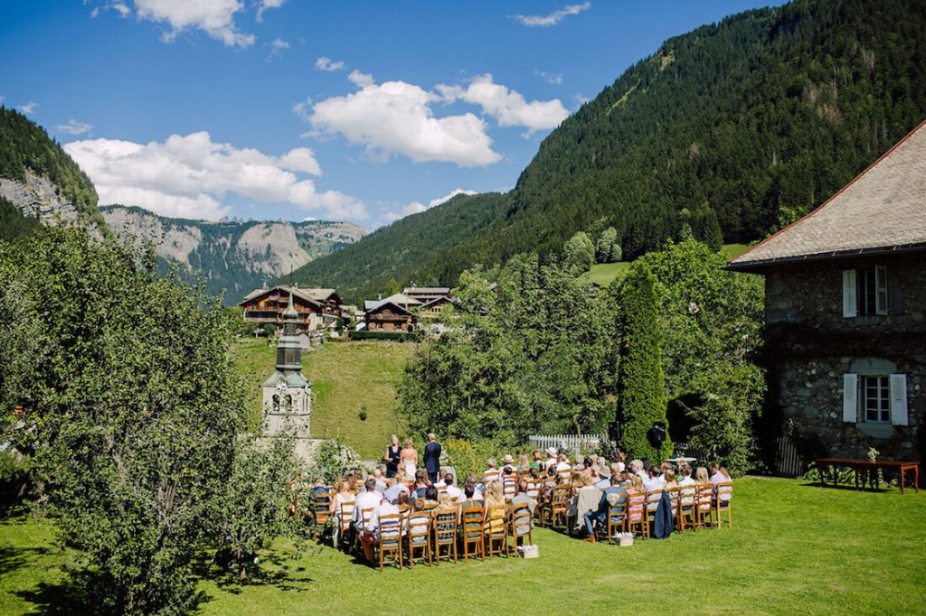 ceremony takes place on the lawn at one of the most uniqe wedding venues in the alps